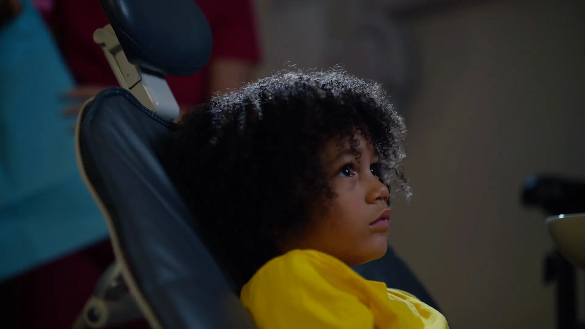 A child sitting in the dental chair at Dental Embassy